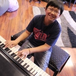 boy_piano lessons aj's music factory